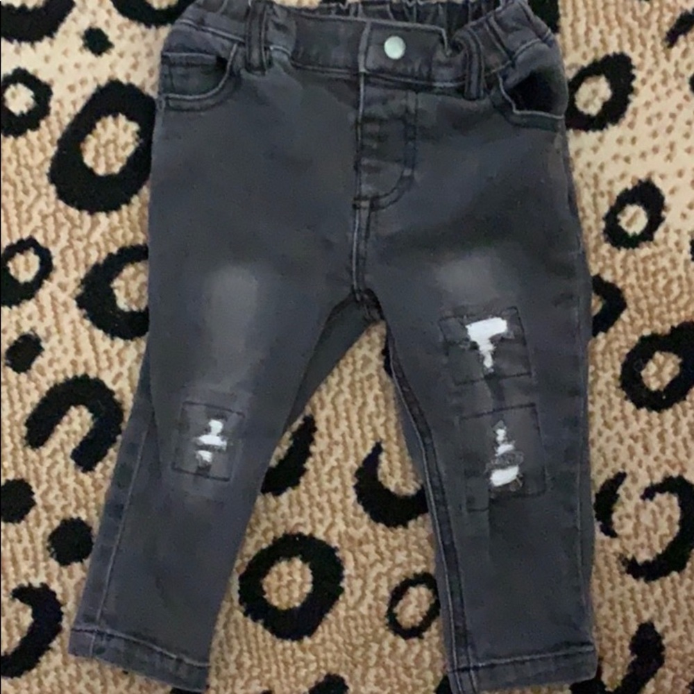 12 month. Black ripped jeans.